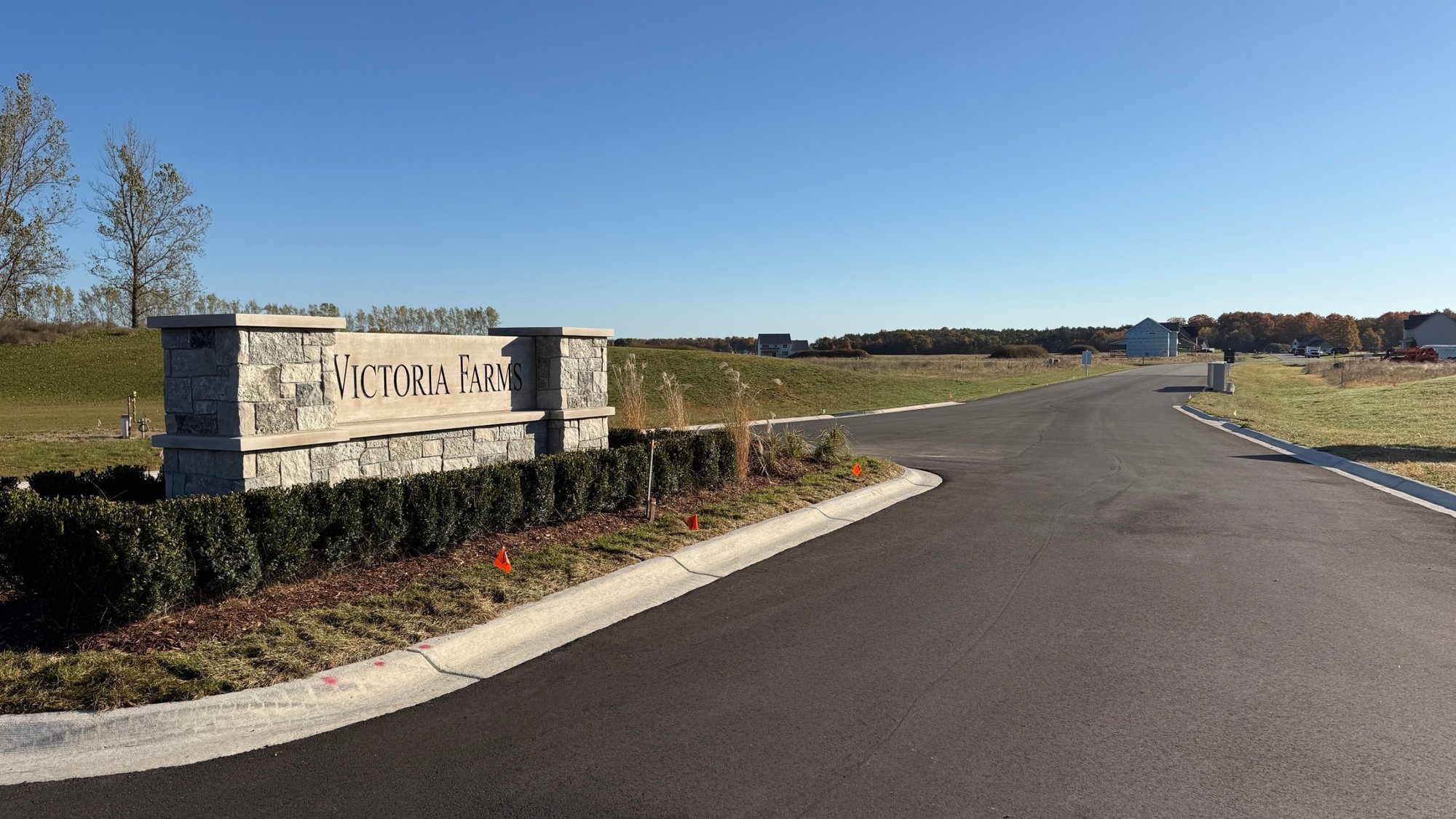Victoria Farms stone entrance sign — East Bay Township